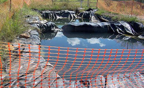 Pond at Metgasco’s test well at Dyraaba. Pond at Metgasco’s test well at Dyraaba.